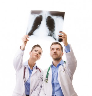 Doctors holding up an x-ray